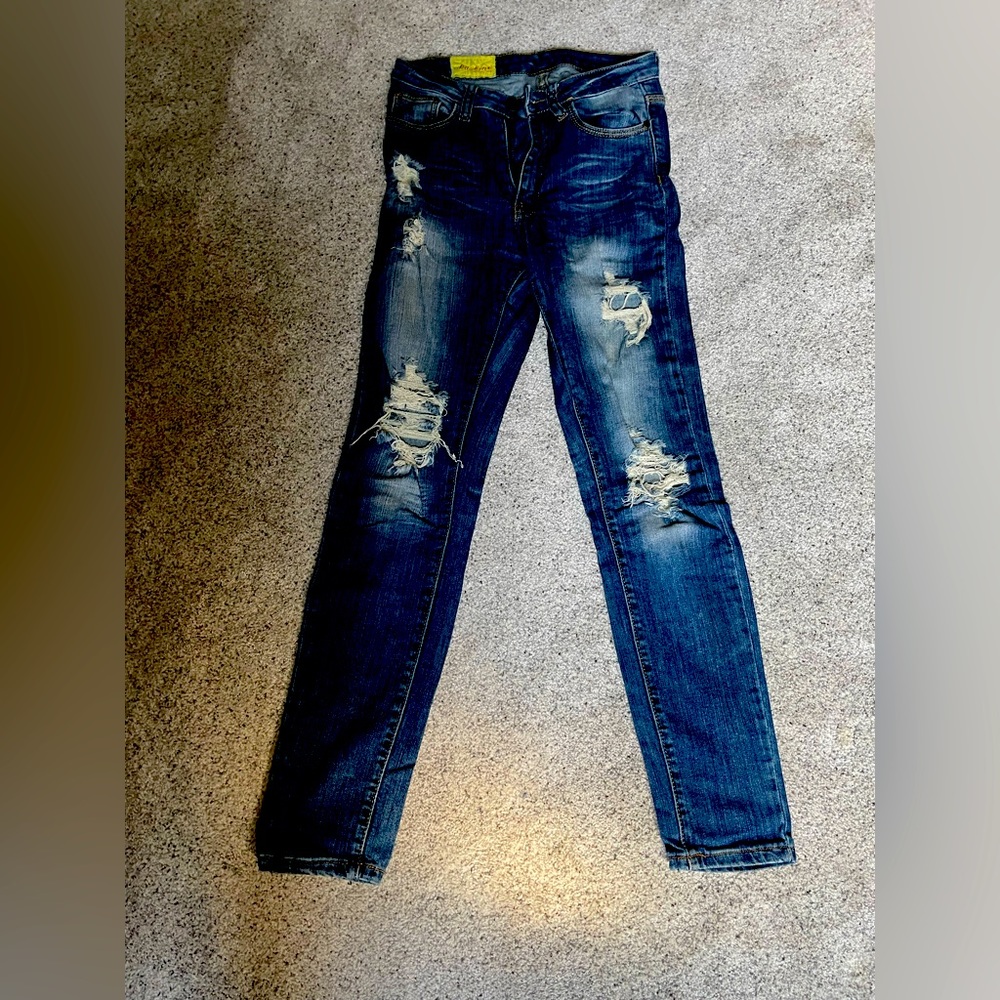 Machine distressed skinny jeans